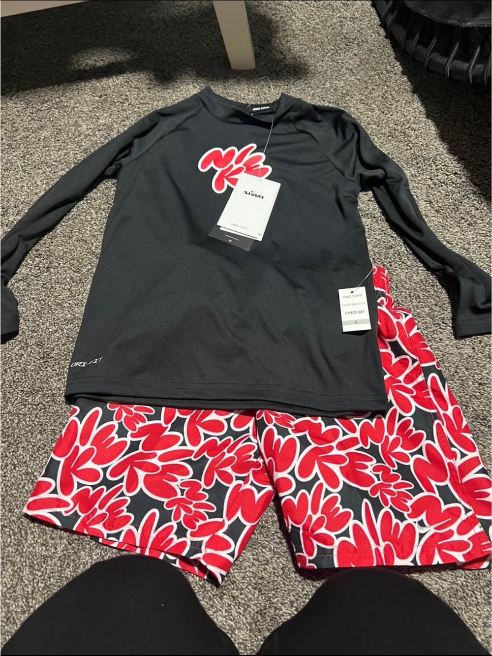 Nike Black Rash Guard with Red and White Floral Swim Shorts